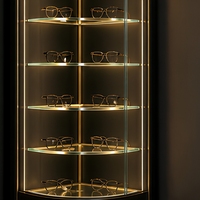 Matt-Schwarzer Goldener Eck-Brillenpräsentationsschrank Gebogenes Glas LED-Regal Optische Einzelhandels-Vitrine