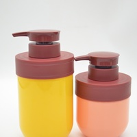 300ml 400ml 500ml Bouteille de lotion ronde Bouteille de pompe ronde en plastique colorée Soins du corps Conteneur d'emballage cosmétique Bouteille de shampooing