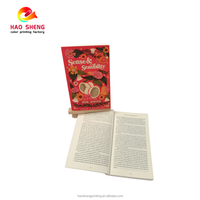 Impression de livres à couverture souple personnalisée avec estampage à chaud or, reliure parfaite, papier offset, design multifonctionnel pour la promotion d'entreprise