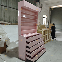 Estante Exhibidor de Uñas de Lujo en Madera Rosa para Salón de Belleza, Moderno Gabinete Aparador para Esmaltes con Luz Led