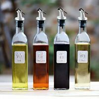 Bouteilles d'huile d'olive en verre transparent de qualité supérieure avec bouchon compte-gouttes pour l'emballage alimentaire gastronomique en gros
