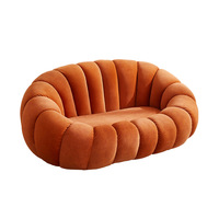 Canapé deux places moderne en tissu capitonné en forme de citrouille pour salon petit appartement