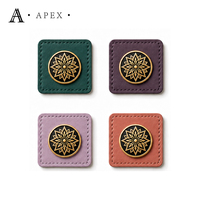 Fabricant d'étiquettes en cuir personnalisées APEX pour vêtements, hijabs, abayas, chapeaux, sacs, chaussures, foulards, patchs en cuir avec logo métallique