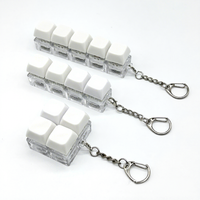 Porte-clés testeur de commutateurs mécaniques à 4 touches - Jouet anti-stress, porte-clés de clavier pour bureau et cadeaux