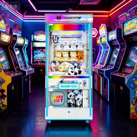 Vente en gros usine : Machine de jeu d'arcade à grue à monnayeur en métal, très demandée, avec garantie d'un an et système audio de qualité