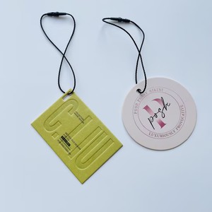 Etiquetas Colgantes Personalizadas con Relieve - Etiquetas Texturizadas con Grabado para Marcas de Ropa, Bolsas y Prendas - Product Image 4