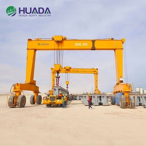 رافعة جسرية ديزل 90 طن بإطارات مطاطية مع وحدة تحكم منطقية قابلة للبرمجة وصندوق تروس للرفع المستقر في مراكز الخدمات اللوجستية - Product Image 4