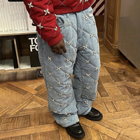 YSJY OEM Jeans vintage sur mesure, coupe bootcut, mode, effet délavé, broderie diamant, jeans stretch déchirés, pantalon évasé empilé pour hommes