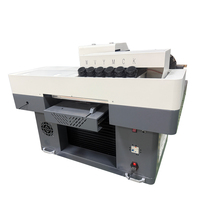 Impresora Plana UV DTF A2 A3 con Cabezal de Impresión I1600, CMYK, Blanco, Barniz, Relieve 3D y Accesorio Rotatorio