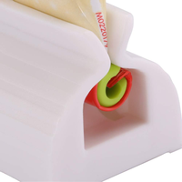 Porte-distributeur de dentifrice animal Tube roulant en plastique Pressoir Extrudeur de dentifrice Accessoires de salle de bain à domicile Fournitures