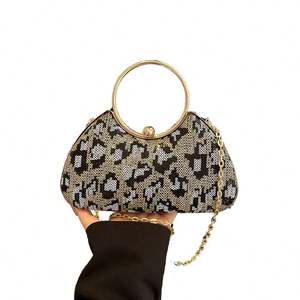 Nueva bolsa de acrílico moderna de estilo europeo y americano con asa cruzada y cadena, perfecta para cenas. - Product Image 1