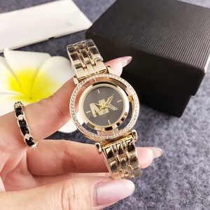 Orologio Unisex con Doppio Cerchio, Logo con Lettere e Diamanti, 38mm, Lusso Leggero, Movimento al Quarzo, Vendita Diretta dalla Fabbrica - Product Image 1