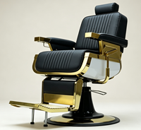 Fauteuil de barbier de luxe rétro avec cadre en métal plaqué or noir, coutures verticales, inclinable hydrauliquement