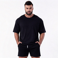 T-shirt uni noir pour homme, coupe classique, col rond, tricoté, 100 % coton, écologique, vente en gros directe usine
