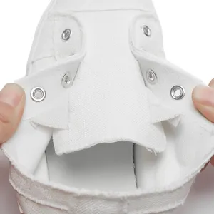 Pabrik KH OEM grosir disesuaikan Logo Slip On tanpa renda karet sepatu kanvas putih untuk wanita klasik