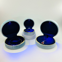 Boîte à bijoux en velours de luxe sur mesure avec logo personnalisé, boîte à bagues avec lumière LED, emballage cadeau avec lumière, fabricant Zhi Hui