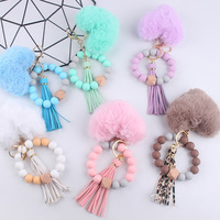 Magnifique porte-clés bracelet en silicone perlé. Pendentif cœur en peluche douce à faire soi-même. Accessoire de clé en plastique, cadeau en promotion.