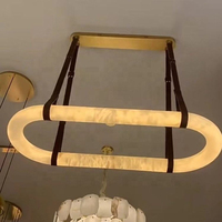 Lustre moderne rond en albâtre avec anneau et sangle en cuir, suspension décorative pour salle à manger, restaurant, hall d'hôtel et projets de décoration