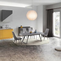 Table à manger extensible moderne avec plateau en marbre durable et pieds en acier inoxydable à hauteur réglable pour une salle de bain au style luxe léger