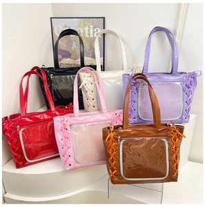 Bolso de PVC personalizado en varios colores con cordones cruzados, bolsillo frontal transparente, bolso de hombro de moda para uso diario. - Product Image 2