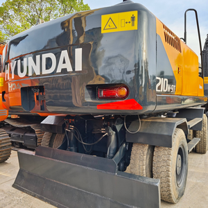 Excavatrice sur pneus Hyundai 210W-9T d'occasion à prix abordable, modèle 2023, poids opérationnel de 21 tonnes, moteur, boîte de vitesses, PLC, en promotion - Product Image 5