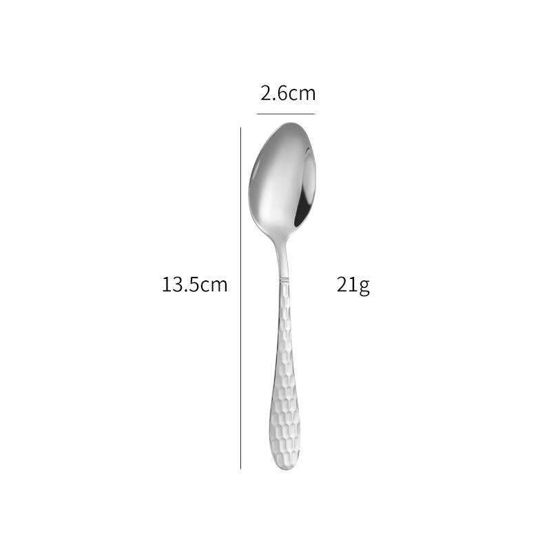 silver tea spoon