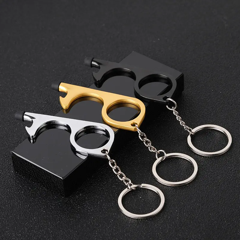 Wholesale free touch bottle metal key ring key chain self-defense key fob door opening tools