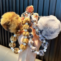 Mode imprimé léopard boule de poils perles téléphone portable porte-clés filles sacs pendentifs voiture porte-clés griffe Machines petits cadeaux