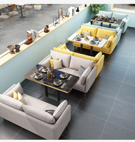 Ensemble table et chaises de restaurant/hôtel au design moderne et épuré avec plateau en ardoise, structure en fer et canapé en cuir PU pour cafés commerciaux