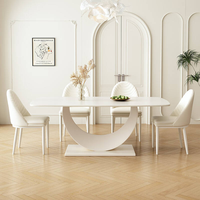 Ensemble de table à manger ronde en acier moderne de luxe avec 6 chaises pour la maison