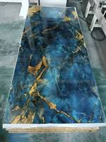 Feuille stratifiée UV de panneau de marbre de PVC à haute brillance 1220x2440mm durable moderne écologique pour le mur de salle de bains de cuisine de chambre à coucher