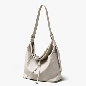 Nuevo bolso de mano de gran capacidad de piel de vaca auténtica de primera capa para mujer, bolsos de hombro con cremallera y borla con lazo para mujer - Product Image 6