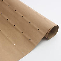 Papel Kraft perforado de corte CAM de 63 "para la base en la fábrica de prendas de vestir