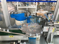 Machine d'assemblage de couvercle de fermeture
