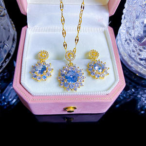 Ensemble collier et boucles d'oreilles en zircon délicat, chaîne en acier inoxydable, plaqué or véritable PVD, fleur tombante, bijoux de mariée pour femmes - Product Image 1