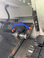 Torno CNC de Bancada Inclinada Horizontal LICHI LC-X36SD con Doble Husillo, GSK, Control FANUC, Certificación CE, Bajo Costo de Mantenimiento, Nuevo