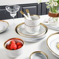 Ensemble de bols et d'assiettes en céramique à motif marbré avec bordure dorée, style luxe léger, pour la maison, vaisselle de table