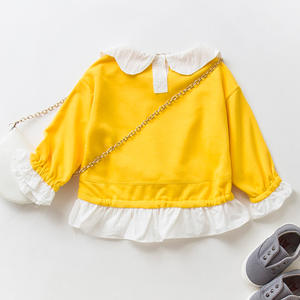 Últimos Modelos de Blusas para Niñas con Cuello de Solapa de Color, Diseño Casual con Volantes en el Bajo, de Fábrica China - Product Image 4