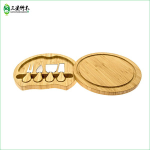 Bamboo <b>cheese</b> cutting board and <b>knife</b> <b>set</b>, round <b>cheese</b> cutting board <b>set</b> with rotation, cooked food plate and cutting board. - Product Image 1