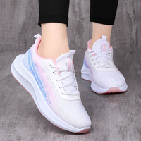 Chaussures de sport décontractées en toile de haute qualité coréenne pour femmes et hommes matériau supérieur en tricot à la mouche tendance de la mode pour la marche