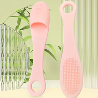Nouvelle brosse nettoyante faciale en silicone couleur macaron 2026, forme patte de chat, lavable, avec trou de suspension pour pores du nez