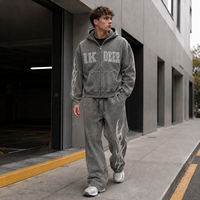 Ensemble survêtement IKDEER personnalisé vintage délavé avec sweat à capuche zippé et pantalon large imprimé flamme pour tenues quotidiennes streetwear et hip-hop