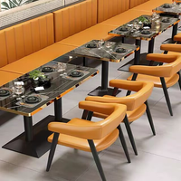 Canapé de restaurant en cuir capitonné personnalisé, table en marbre avec base en fonte pour ensemble de mobilier de café, dîner, bistrot