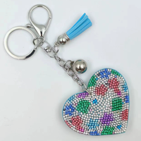 Koningsblauwe modieuze sleutelhanger met luipaardprint, hartvormig, volledig bezet met strass steentjes en kwastjes, best verkochte charme hangende ornament