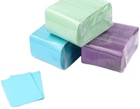Bavoir médical complet en gros étanche pour patient bavoirs dentaires en plastique jetables en rouleau
