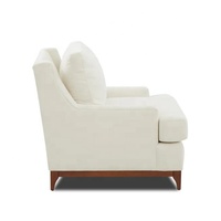 Canapé d'angle en cuir véritable et fauteuil d'appoint en tissu bouclé, design nordique italien moderne, pour projets hôteliers et appartements