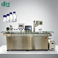 Machine de marquage automatique au laser UV de type convoyeur, haute vitesse, codage précis et traçable pour les emballages cosmétiques et les bouteilles