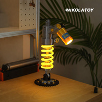 Lampe de bureau créative de style amortisseur de voiture, finition métallique imprimée en 3D, modèle décoratif de bureau en plastique, boîte en carton