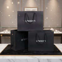 Sacs en papier d'emballage de cadeau de vêtement de mariage de logo personnalisé avec des poignées pour des souvenirs et