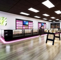 Vitrines décoratives pour magasins de tabac avec lumière led magasin de fumée armoire en verre trempé dispensaire comptoir de contrôle